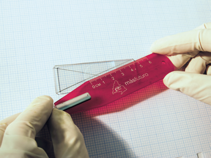 a person holding a ruler