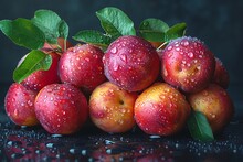 a group of apples with water drops on them