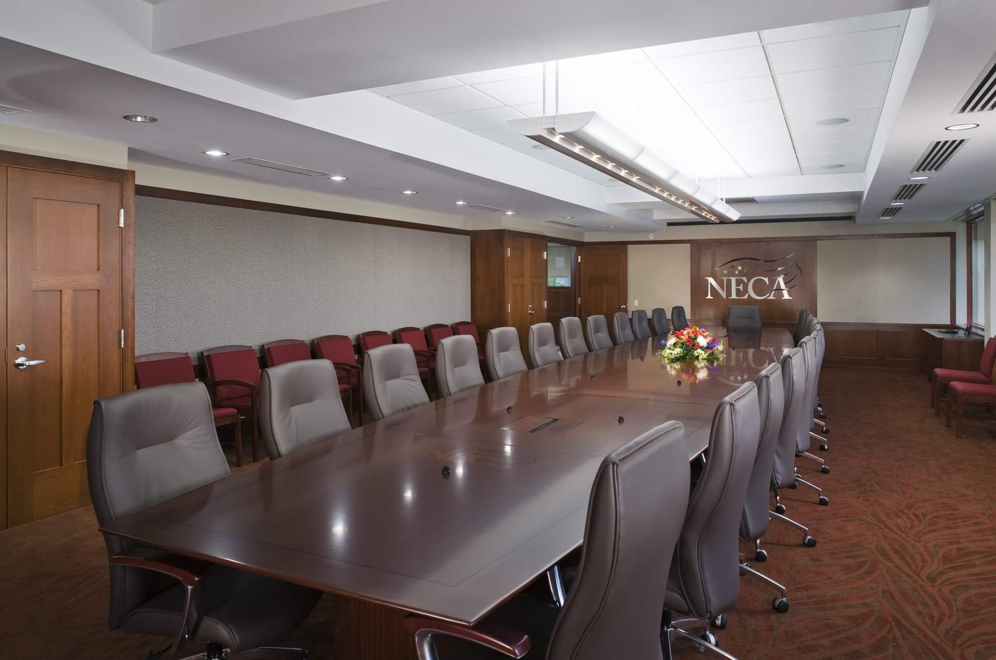 a conference room with chairs and a table