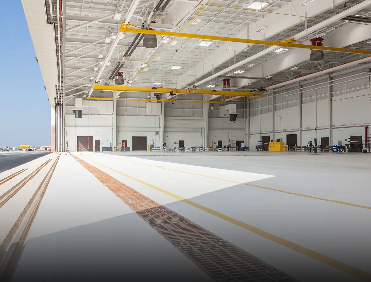 a large white room with yellow lines