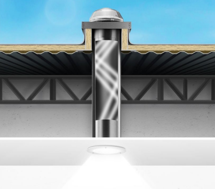 a metal pipe with a light on the roof