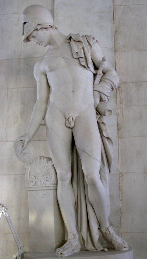 a statue of a man holding a sword