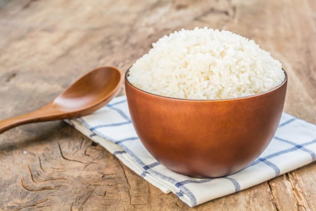 a bowl of rice and a spoon