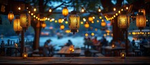 a group of tables and chairs with lanterns