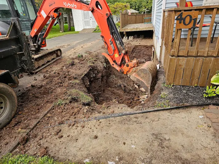 a construction machine digging a hole in the ground