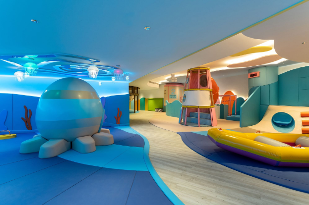 a room with a variety of colorful play equipment