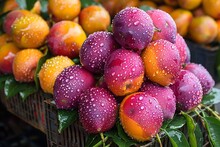 a basket of fruit with water droplets on it