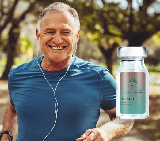 a man running with earphones and a bottle of vitamin b2