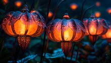 a group of lanterns in the dark