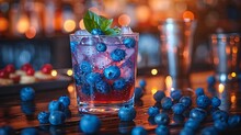 a glass of blueberry drink