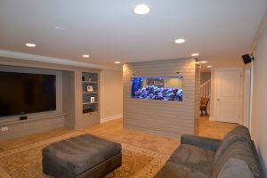 a living room with a fish tank