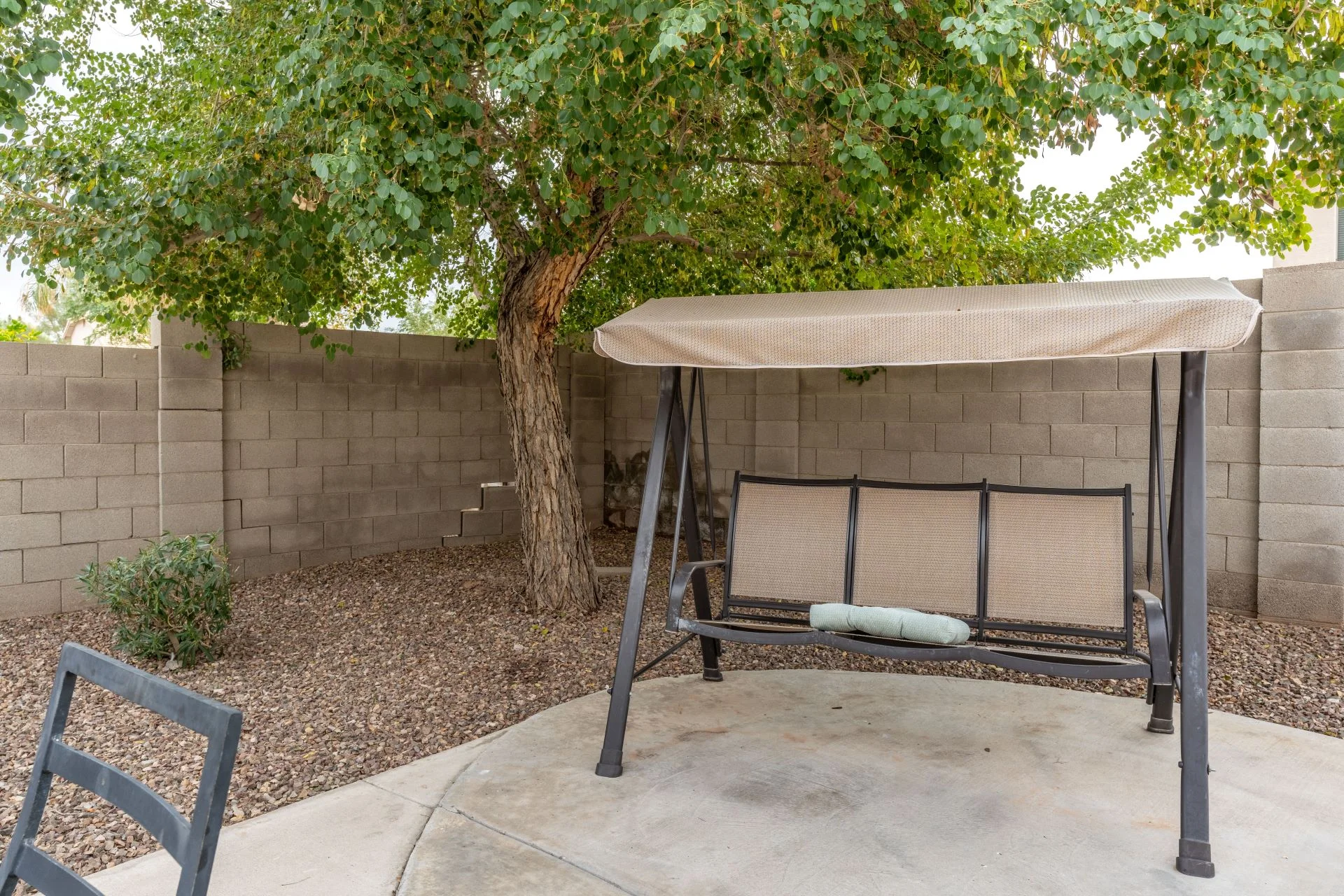 a bench under a canopy