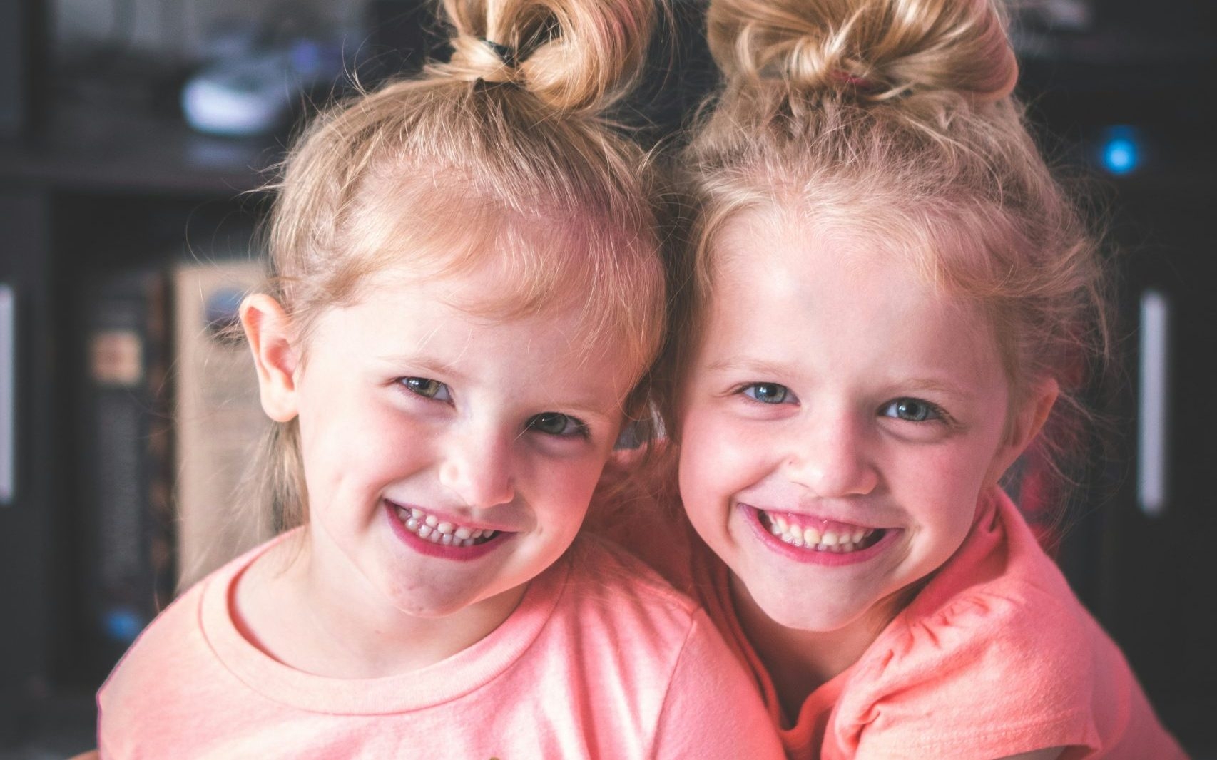 two girls smiling for the camera