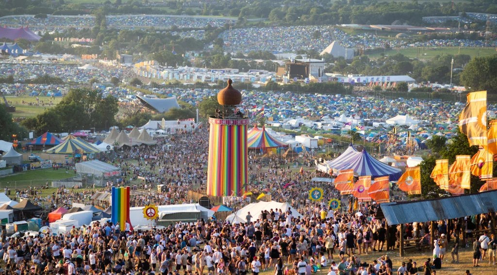 a large crowd of people at a festival