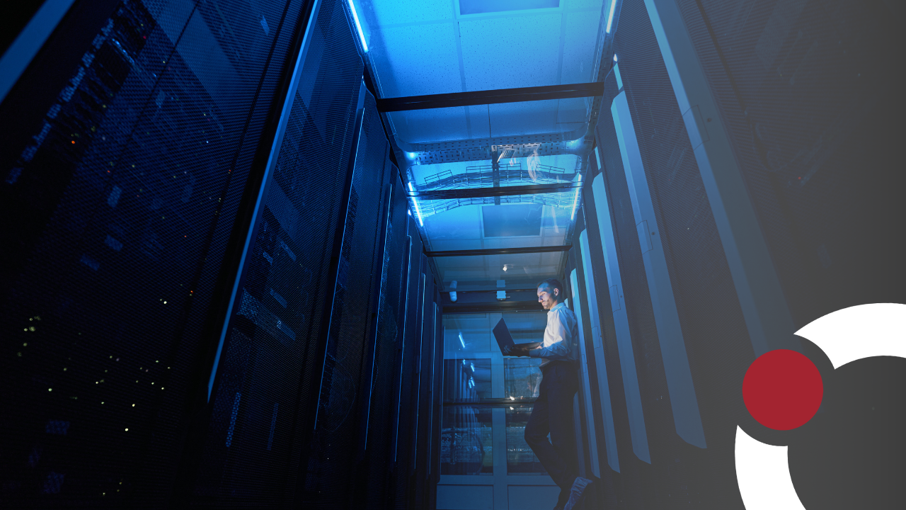 a man standing in a server room