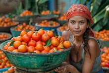 a woman holding a bowl of oranges