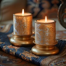 two candles on a table