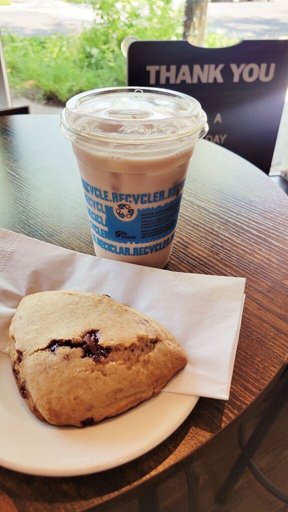 a pastry and a drink on a table