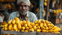 a man with a pile of bananas