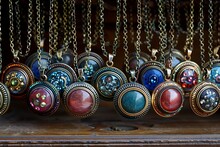 a group of necklaces with different colors