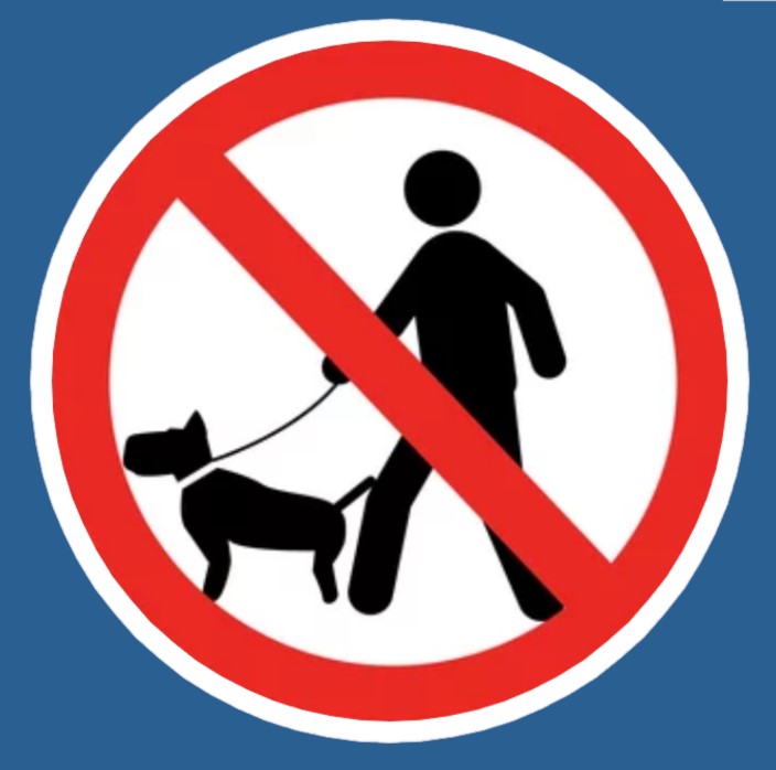 a sign with a dog and a person walking