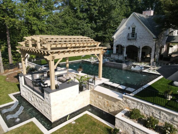 a pool with a gazebo and a house