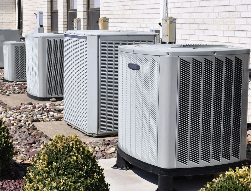a group of air conditioning units