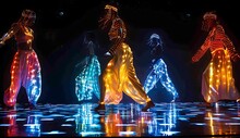 a group of people dancing on a stage