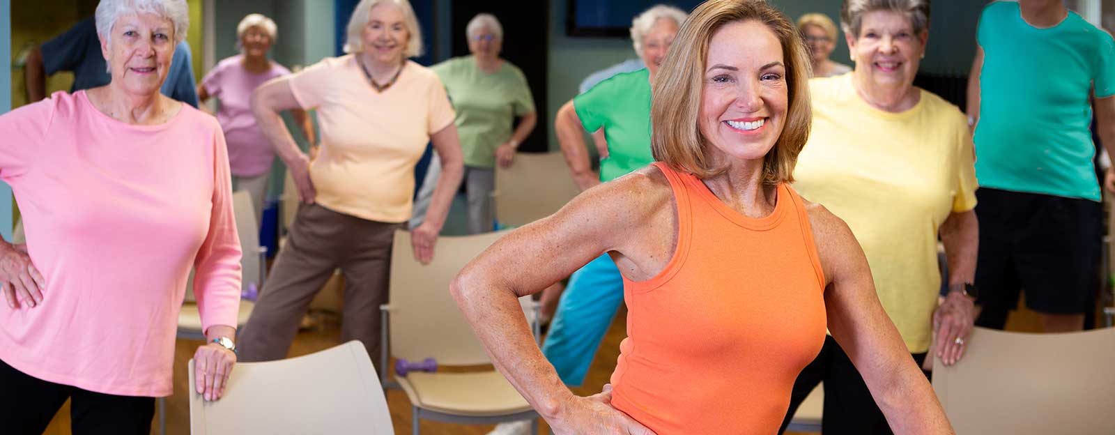 a group of older women in a gym