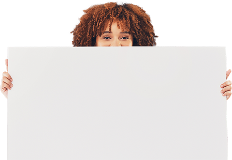 a woman with curly hair and a white sign