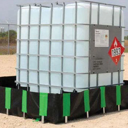 a large white container on a black and green platform