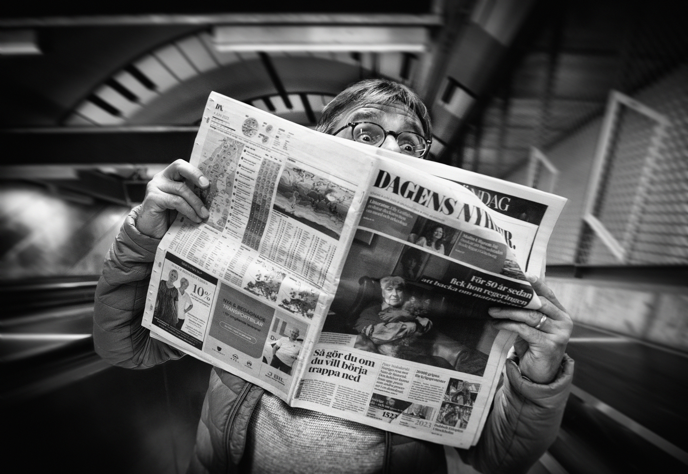 a man reading a newspaper