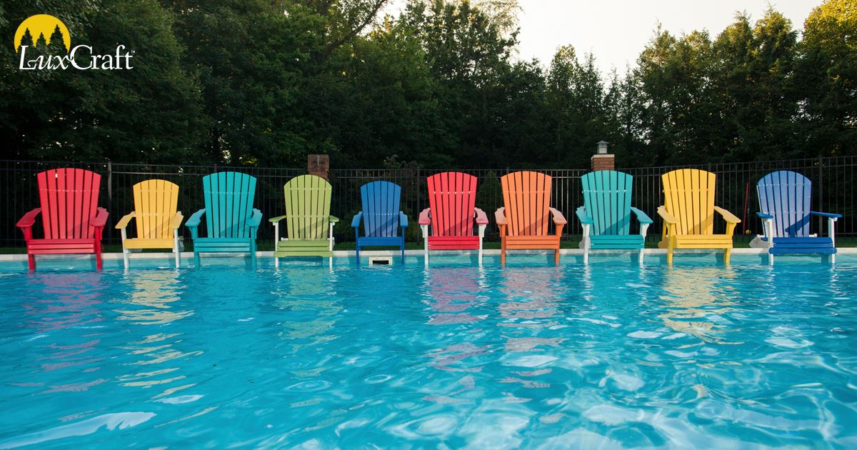 a row of colorful chairs in a pool