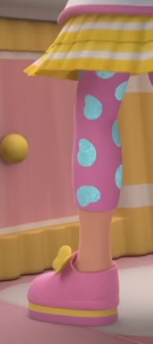 a cartoon character leg with blue and pink polka dots