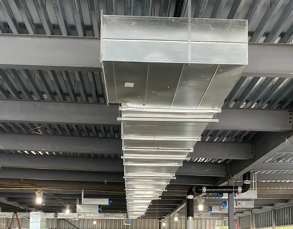 a metal rectangular object on the ceiling