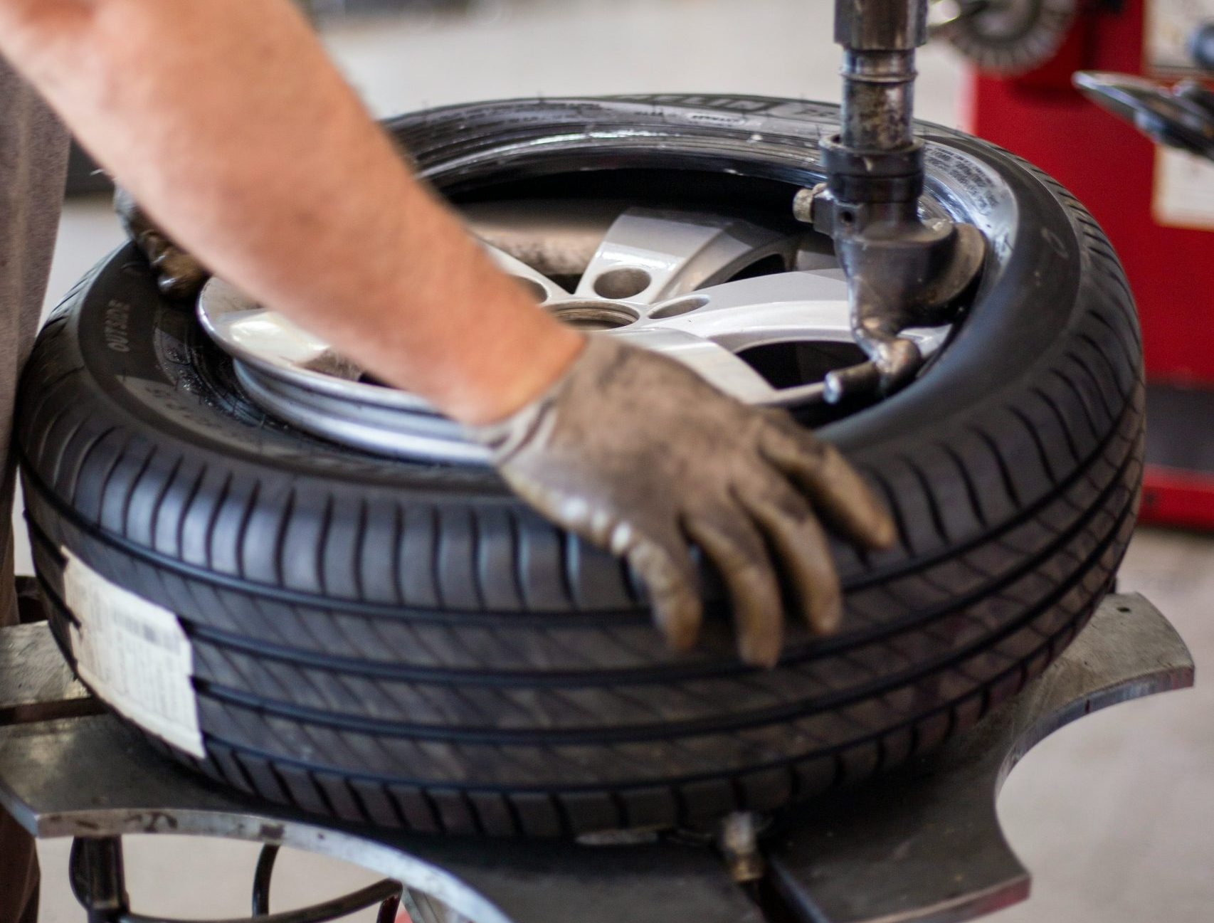 a person working on a tire