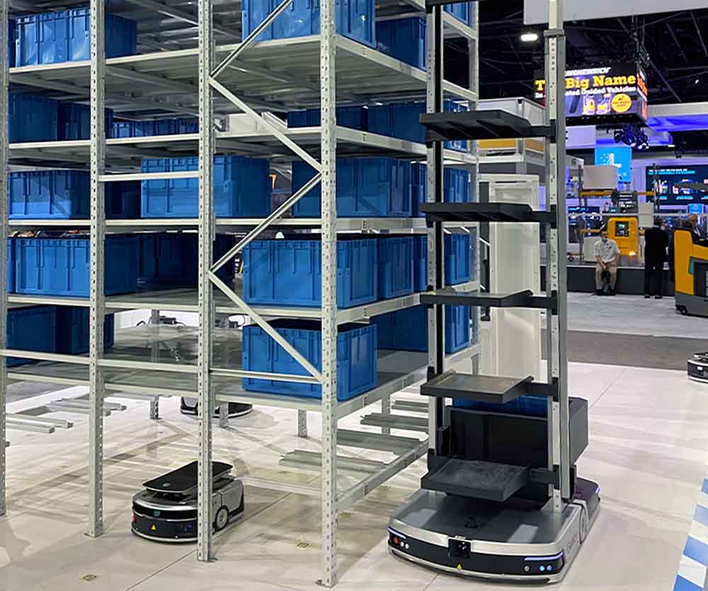 a robot moving boxes on a shelf
