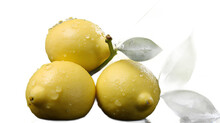 a group of lemons with leaves