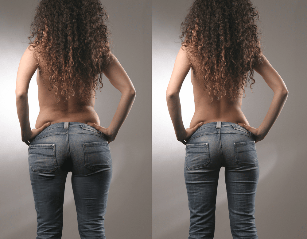 a woman with curly hair wearing jeans