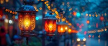 a row of lanterns on a street