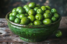 a bowl of green olives