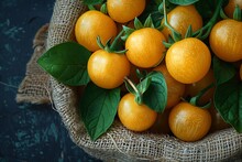 a bowl of yellow tomatoes