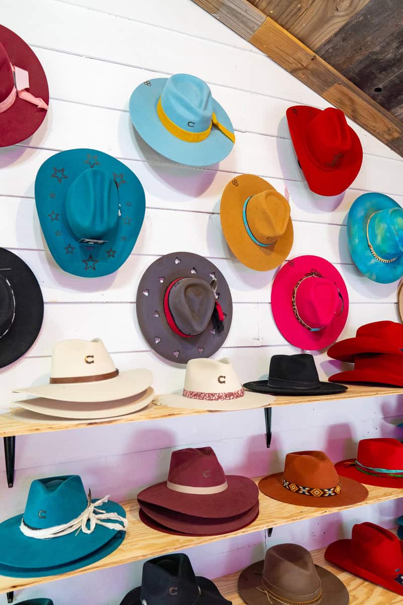 a group of hats on a wall