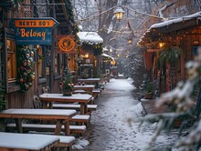 a snowy alley with tables and chairs