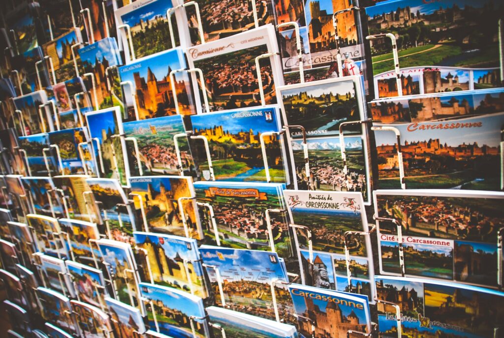 a group of postcards on a wall