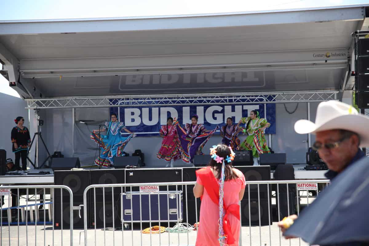 a group of people performing on stage