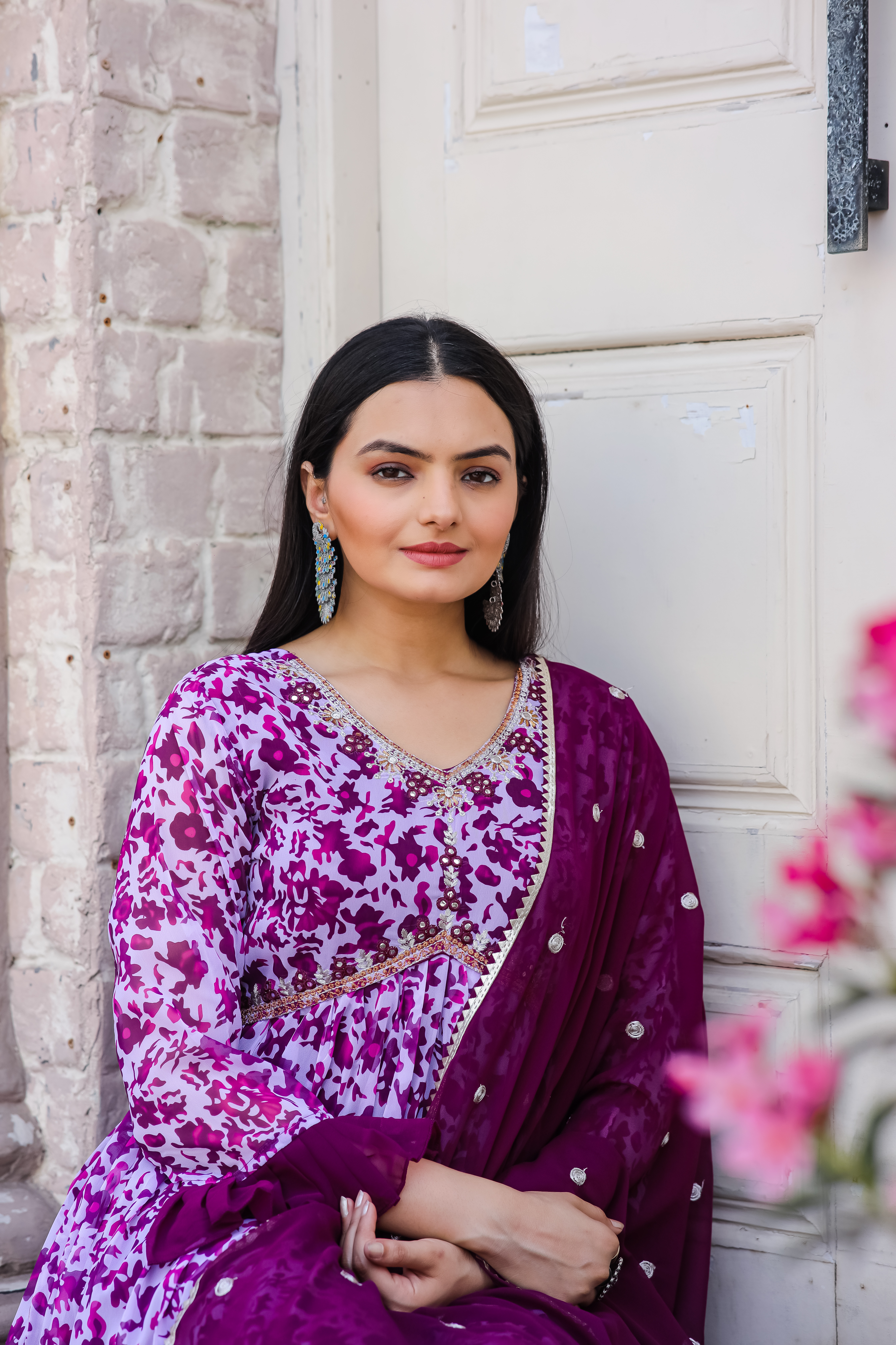 a woman in purple dress