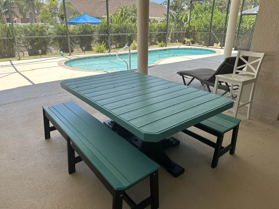 a picnic table and benches on a patio