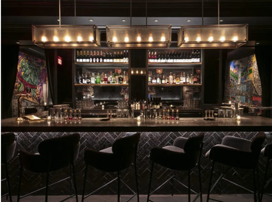 a bar with bottles and shelves