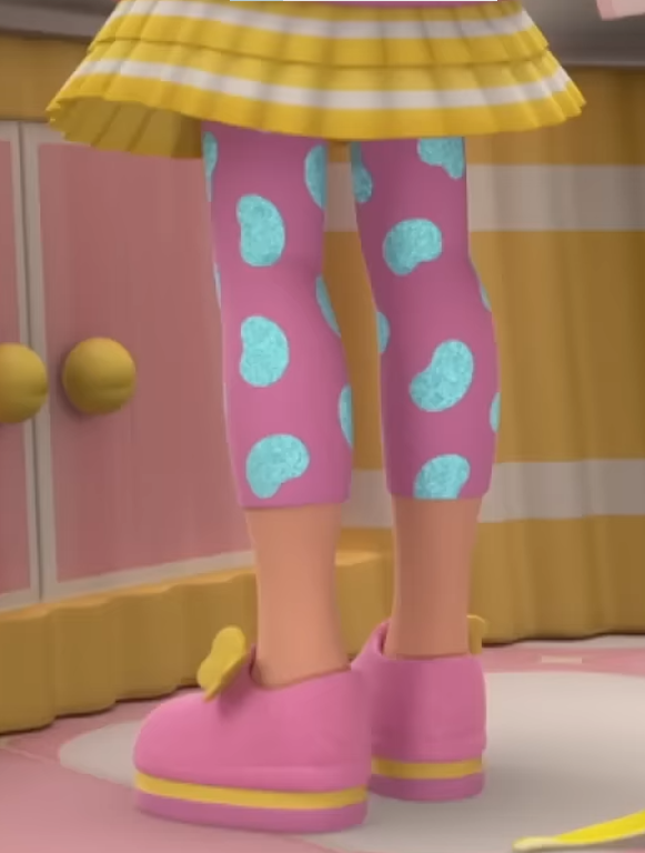a cartoon of a girl wearing pink and blue polka dot leggings